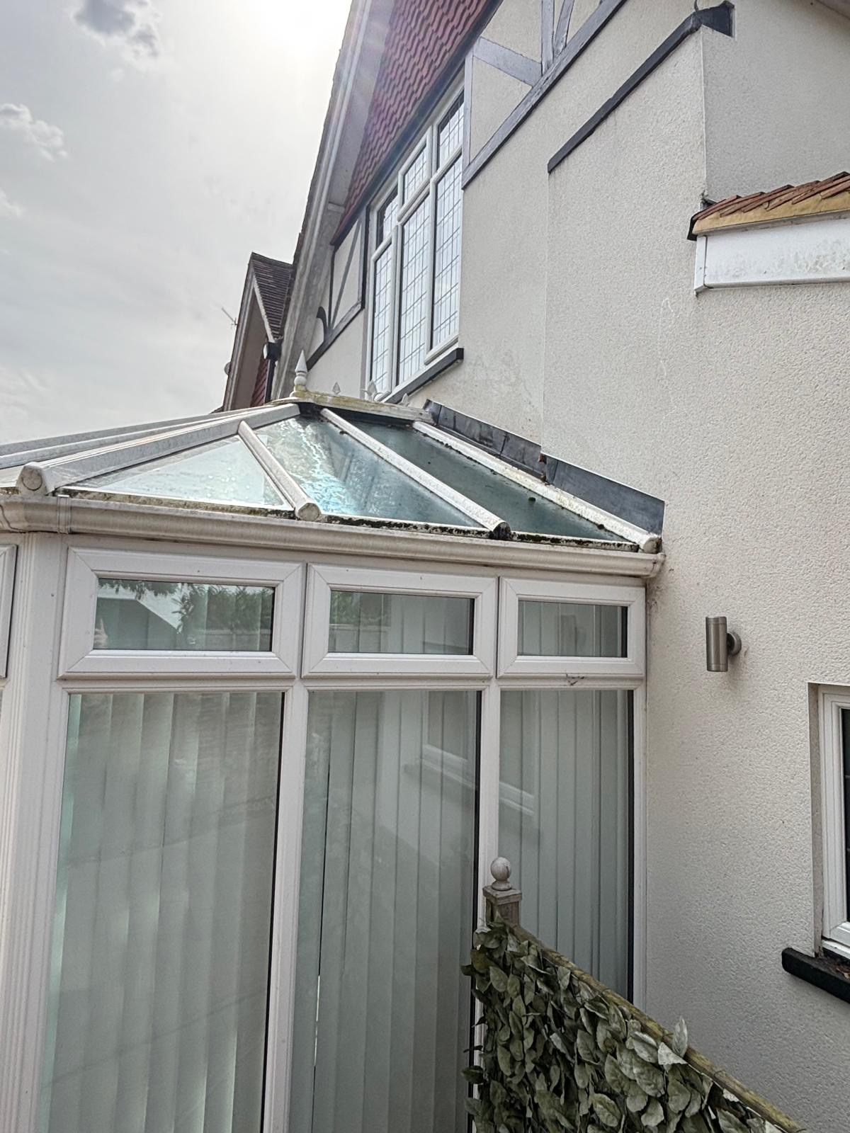 Dirty conservatory roof and frames before cleaning by Noble Exterior Cleaning