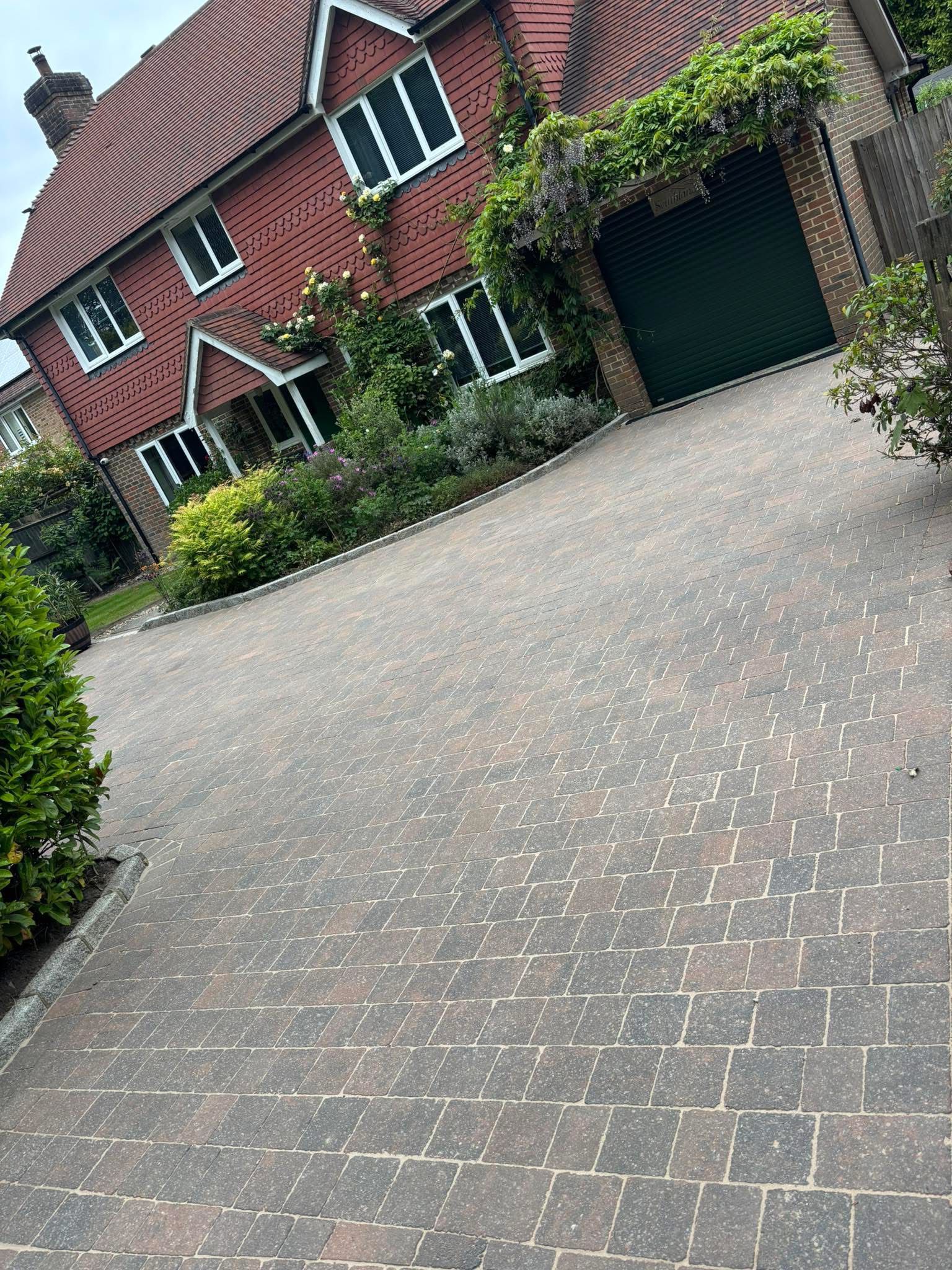 Block-paved driveway after cleaning by Noble Exterior Cleaning