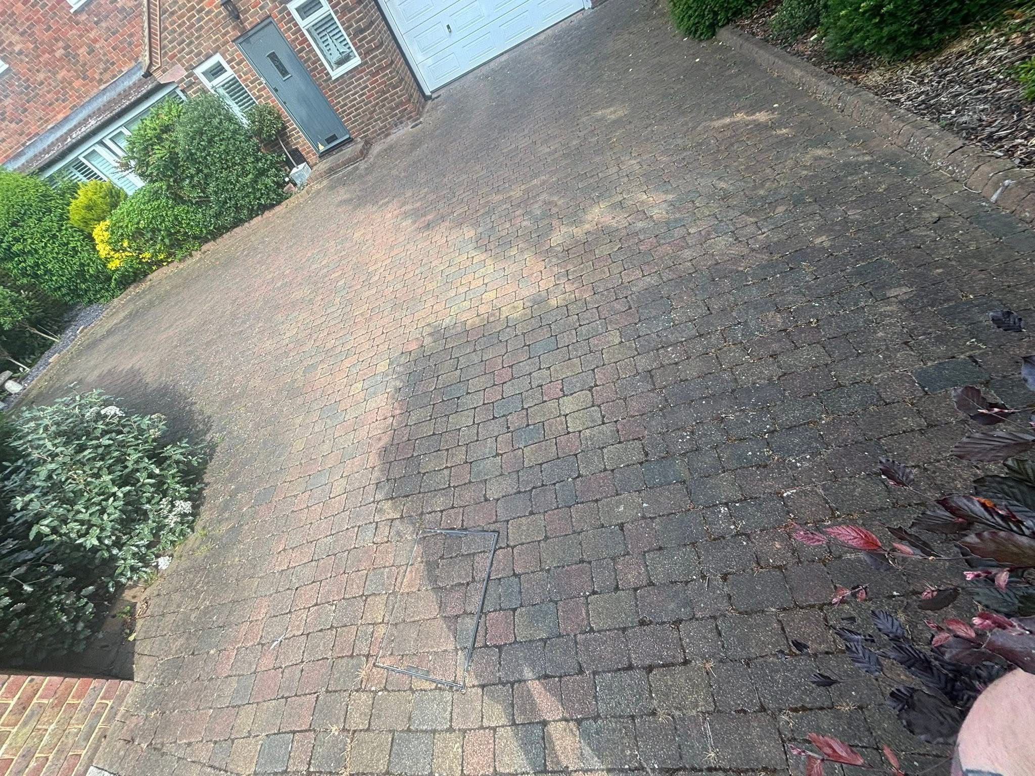 Block-paved driveway before cleaning by Noble Exterior Cleaning