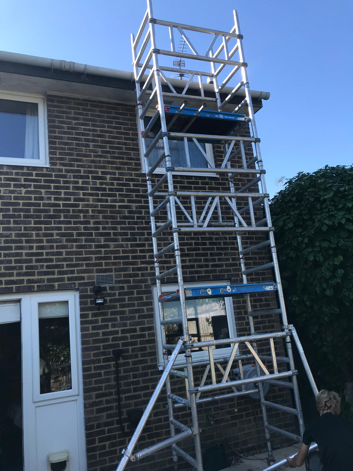 Access tower positioned for a Noble roof-cleaning project